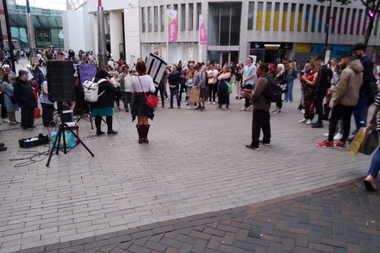 Ring of protesters circled around speakers
